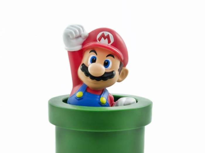 Mario going down a pipe