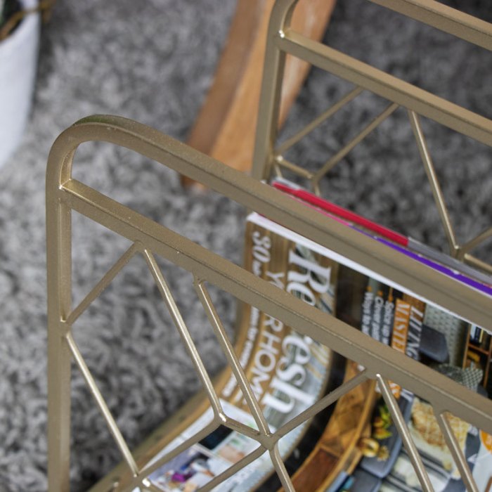 Gold metal magazine rack