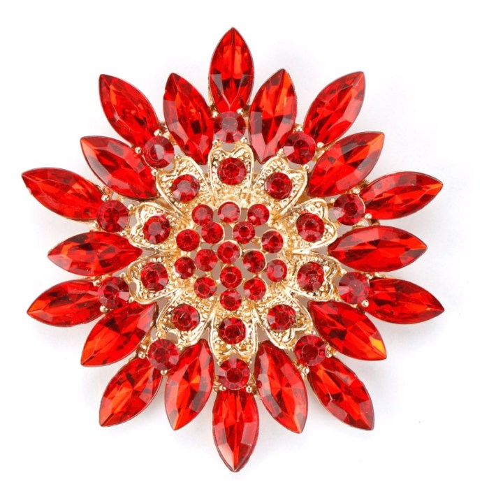 Red and gold brooch